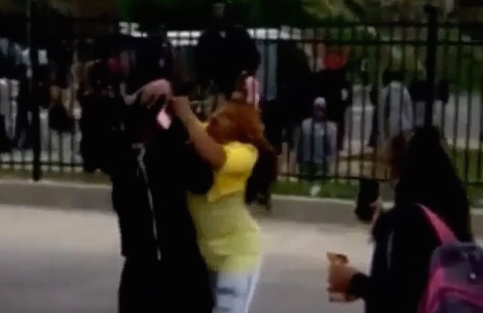 Woman Called 'Mom of the Year' After Yanking Demonstrator Off Streets On Live Television: 'Get Over Here Now!