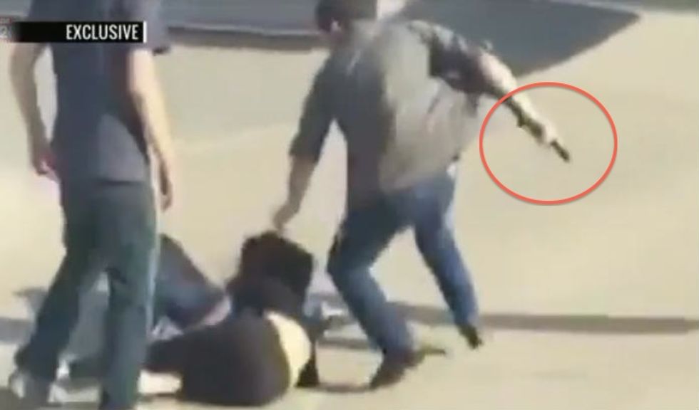 Man Breaks Up Skate Park Brawl Between Two Teens, but What You See Flash Across the Screen in His Right Hand Is Raising Eyebrows