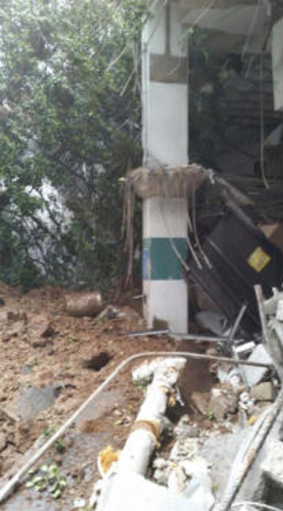 Photos: One Injured After Parking Garage Collapse at Famed Watergate Complex
