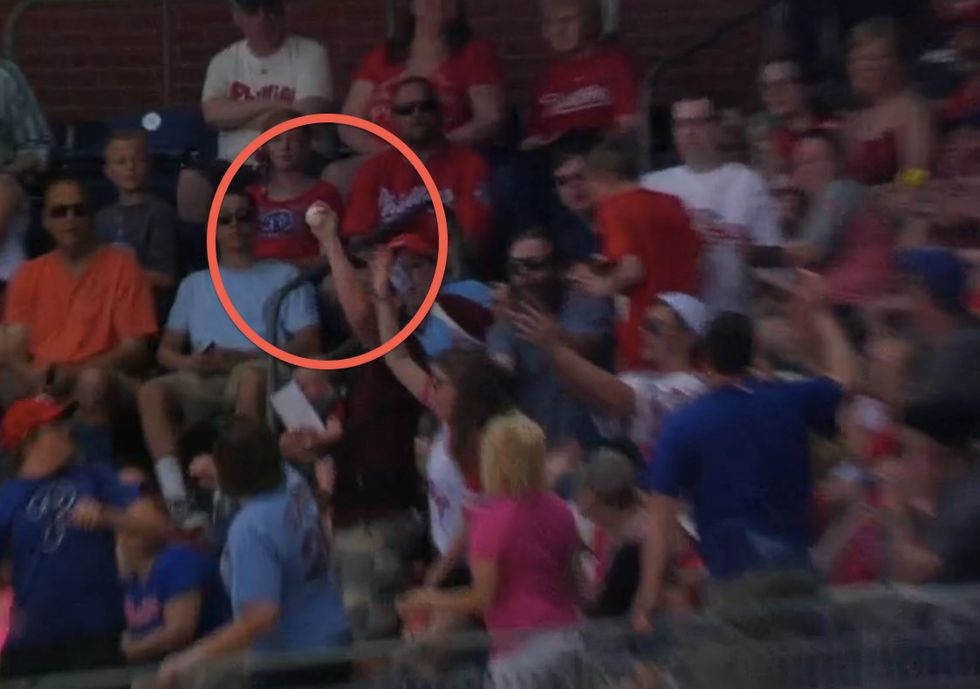 Hard Foul Ball Headed Straight for Him. Baby Boy Strapped to His Chest. But This Dude Doesn't Duck...