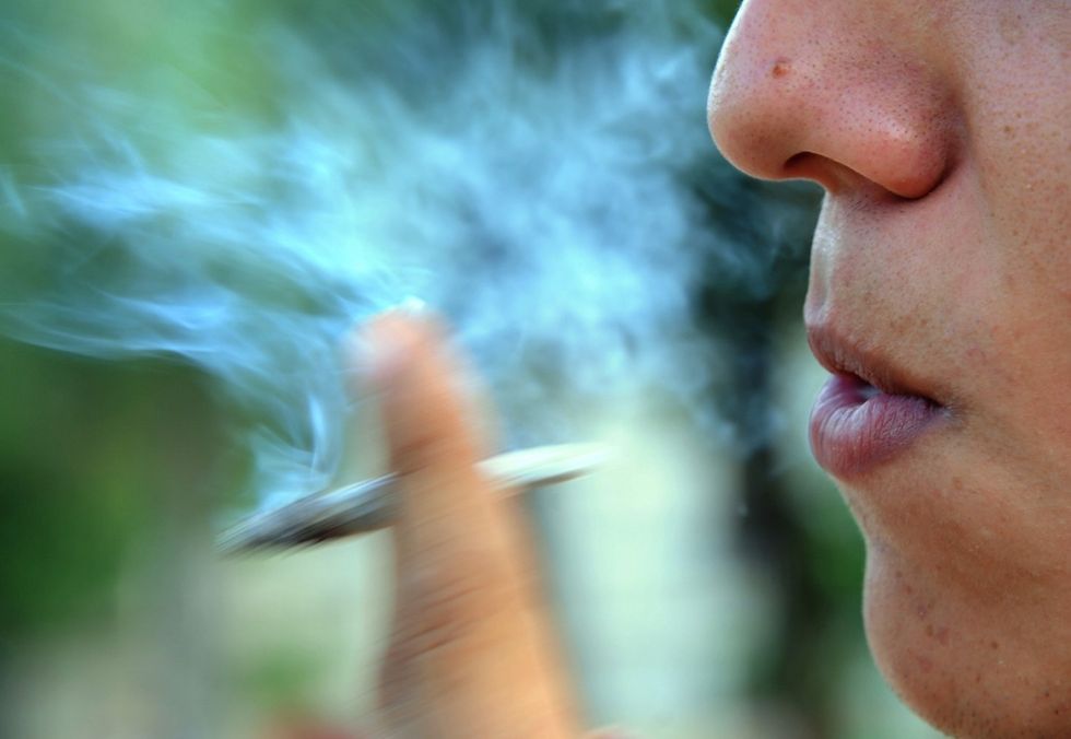 Study Put Nonsmokers in an Unventilated Room With People Smoking Pot — Here's What Happened