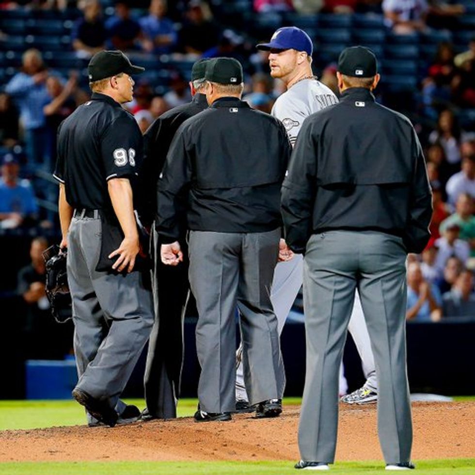 Can You Tell Why This Brewers Pitcher Was Ejected After Throwing Just Four Pitches?
