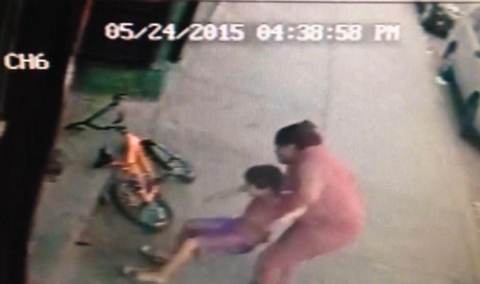 7-Year-Old Boston Boy Shot as He Rode His Bike to Buy a Bottle of Water. Video Captures Mother's Horror as She Finds Him Bleeding on the Sidewalk.