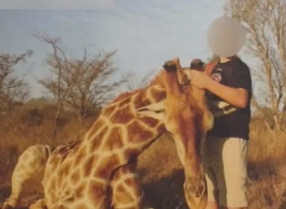Students 'Appalled’ Over Classmate's 'Senior Ad' Photo of Him Posing With Dead Giraffe — Now the High School Is Apologizing
