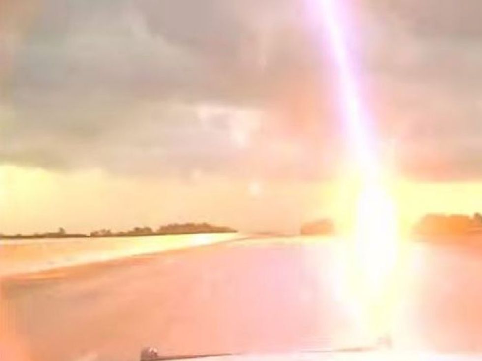 Caught on Camera: Massive Lightning Bolt Barely Misses Officer's Patrol Car