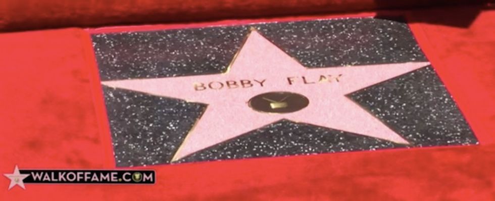 Take a look at what someone flew behind a celebrity chef as he got his Walk of Fame star.