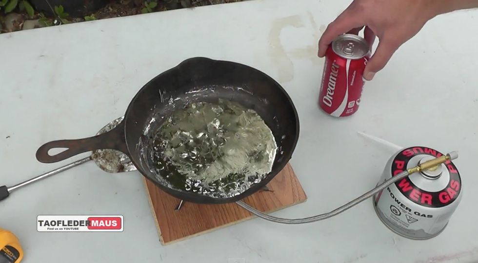 Man Gets 'Unexpected' & 'Mind-Bending' Surprise After Pouring Can of Coke Onto Molten Lead