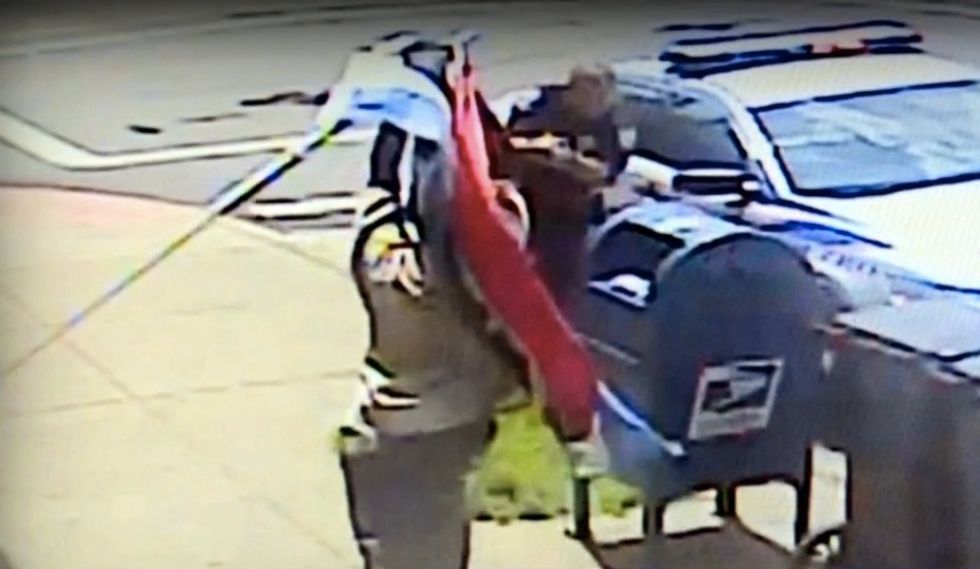 Surveillance Video Shows Man Fatally Shot After Charging, Swinging Flagpole at Cop
