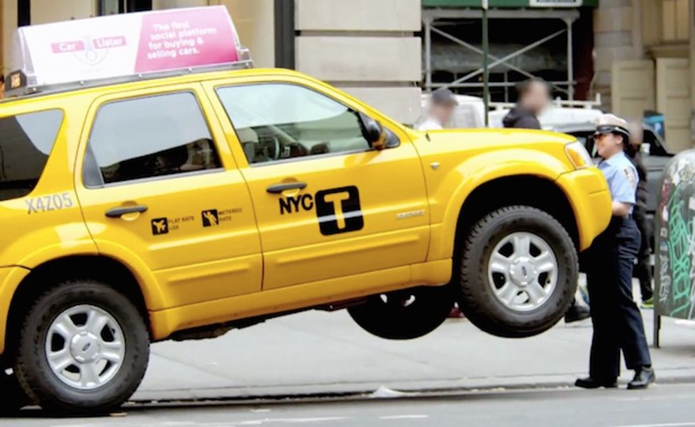 Watch: Jaws Drop as an NYC 'Traffic Officer' Lifts Illegally Parked Cab 