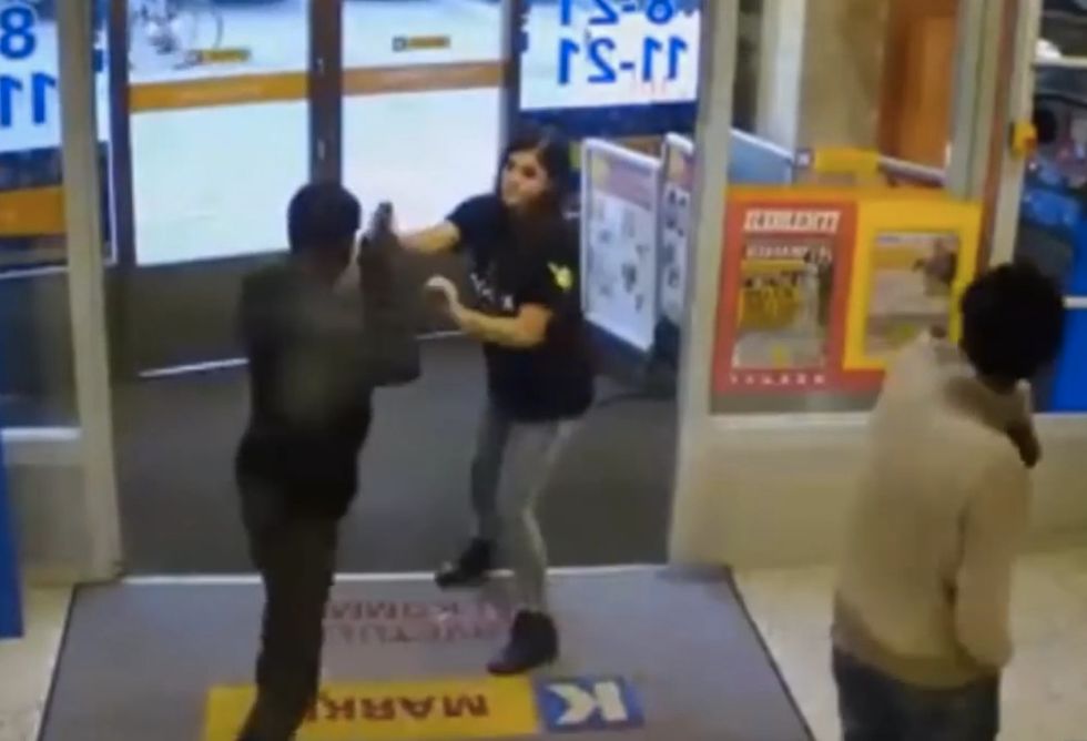 They're Betting They Can Waltz Right Past This Woman Working Store Entrance Without Paying for Their Beer. It's a Bad Bet.