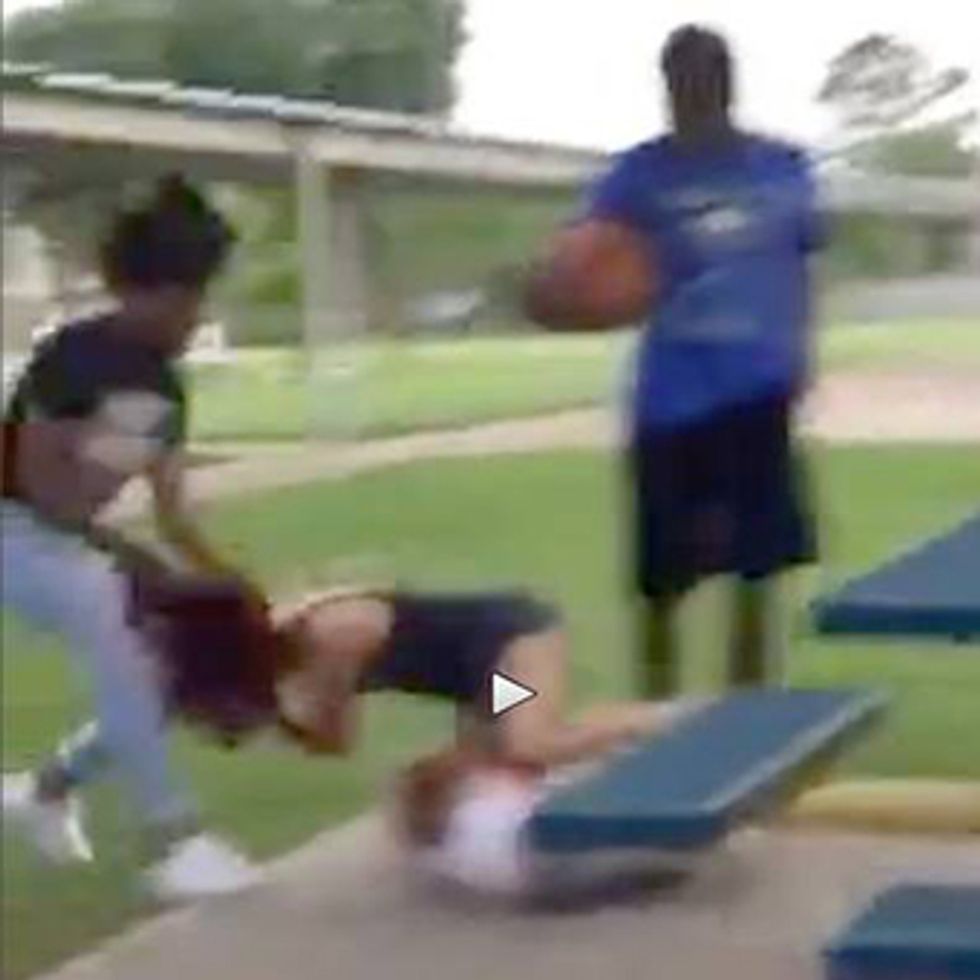 13-Year-Old Girl Arrested, Charged After Shocking Video of Attack on Girl Holding Young Child Goes Viral