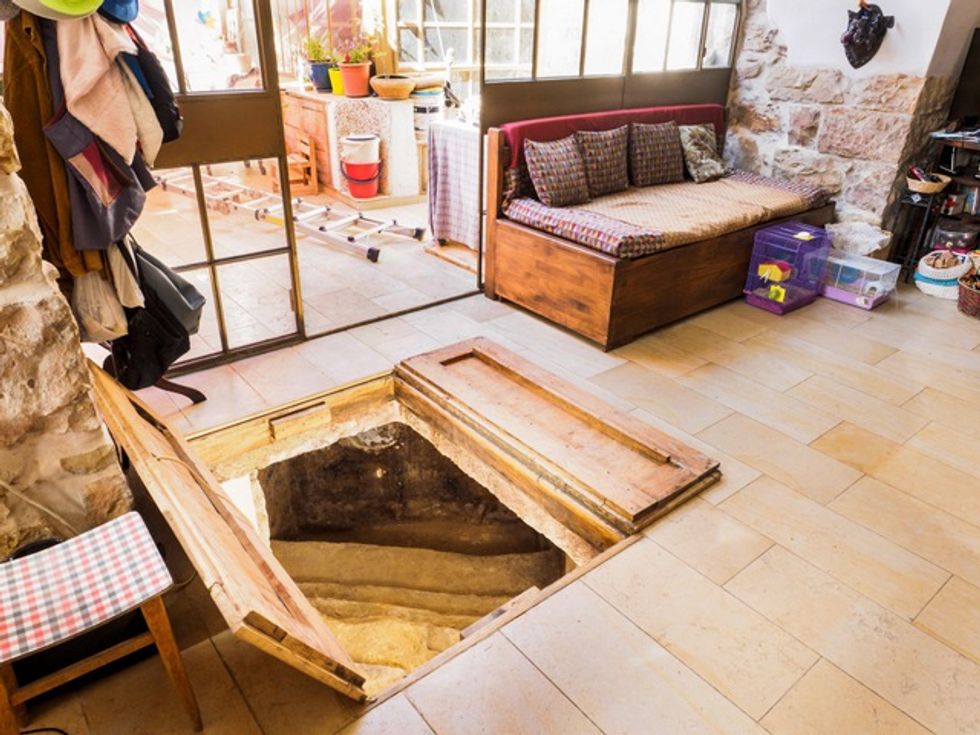 Family Makes Incredible Religious Find While Renovating Their Living Room