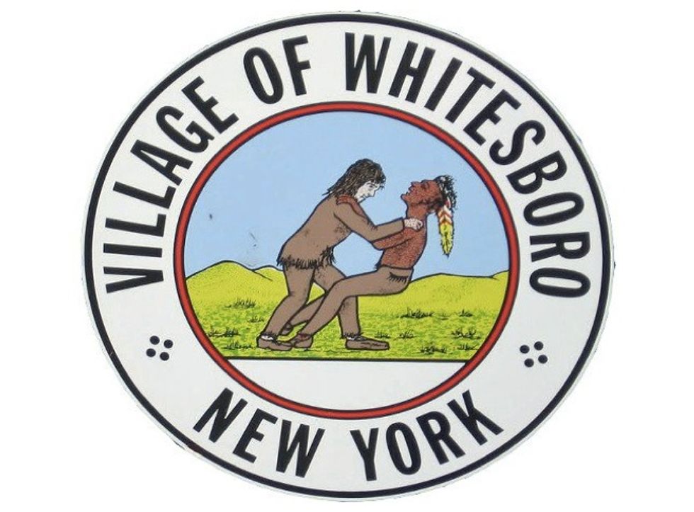 Town Emblem Depicting 'Friendly Wrestling Match' Involving American Indian Called 'Racist in Every Sense