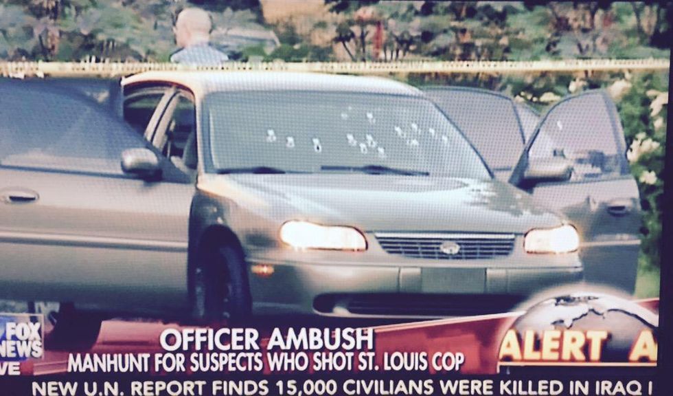 Many ‘Disgusted’ By Sign Protester Displayed at Crime Scene Where Gunman ‘Tried to Assassinate’ Cop