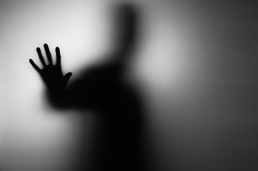 His Cousin Snapped a Photo of Him. But What He Claims to Have Later Discovered Floating Above Him Has Left Him Absolutely Terrified.