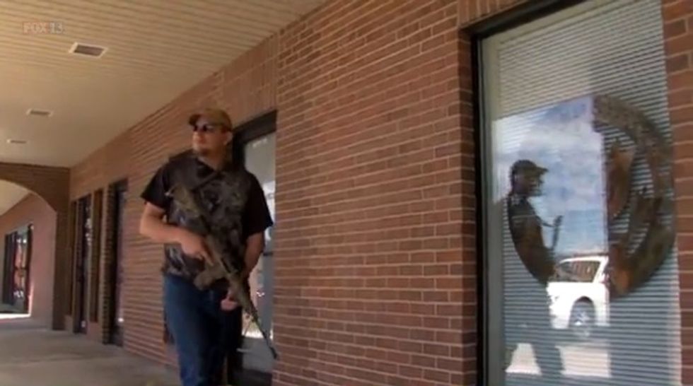 Armed Man Guarding Military Center Says Point He Wants to Make Can Be Conveyed in Four Brazen Words