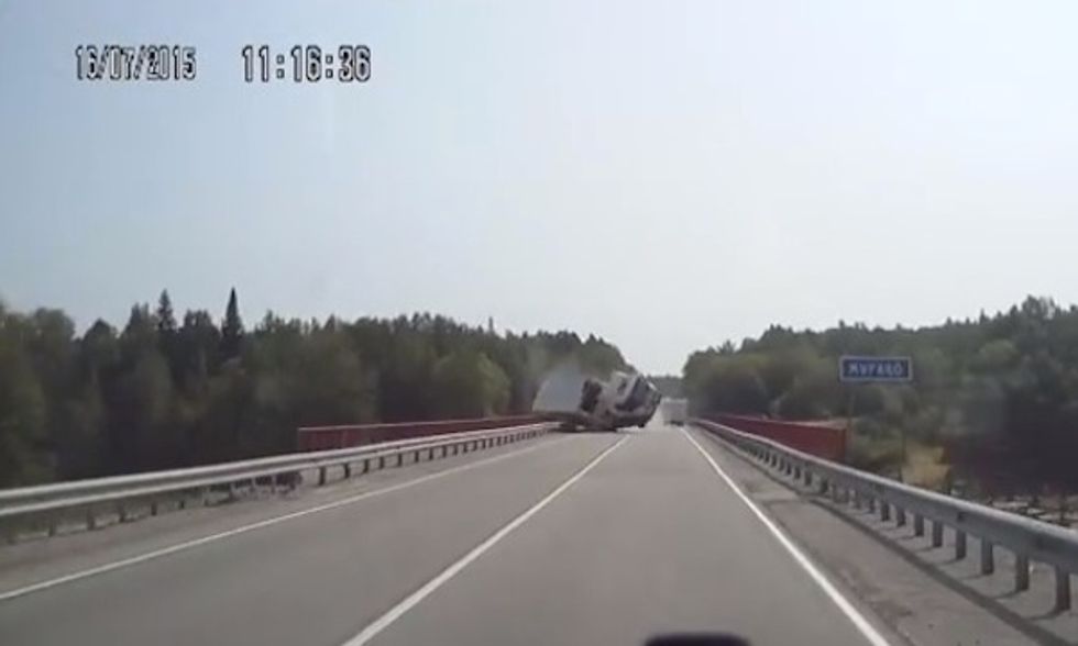 Dashcam Video Captures Six Seconds of Sheer Terror After a Semitruck Blew a Tire on a Bridge