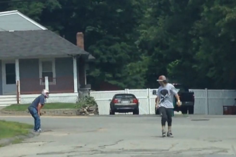 Pretending to Carry Gun, Motorcyclist Throws Punch Through SUV Window. That Was a Big Mistake.