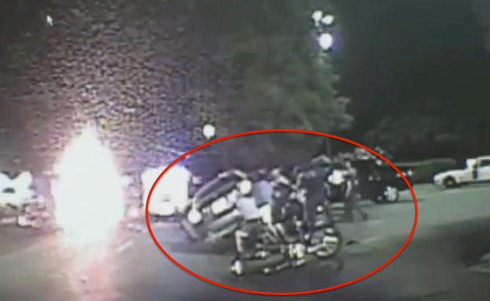 Watch as Cops and Firefighters Actually Lift Car Off the Ground to Save Woman's Life