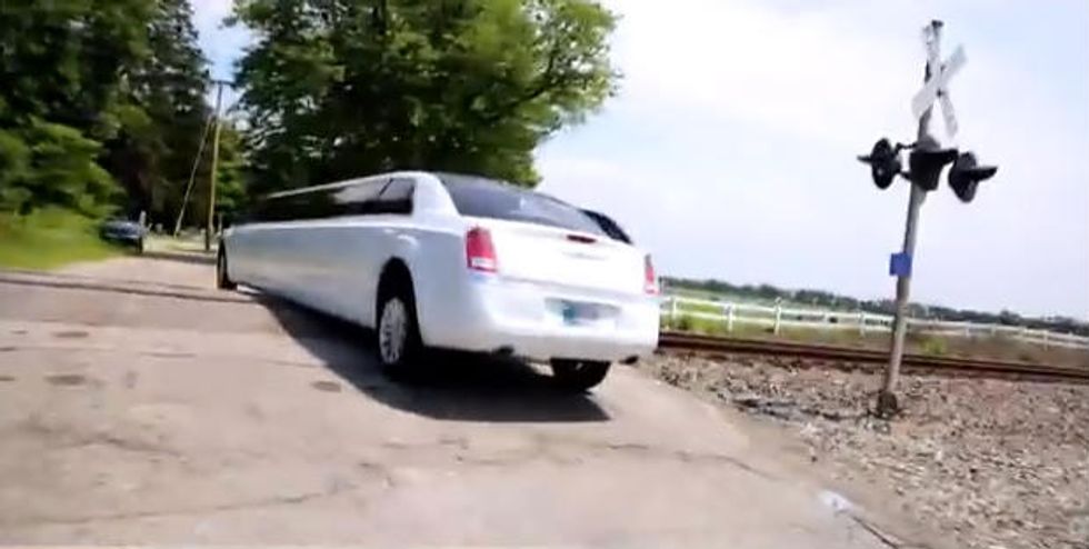 Video Captures What Happens When a Limousine Can't Get Out of the Way of a 10,000 Ton Freight Train