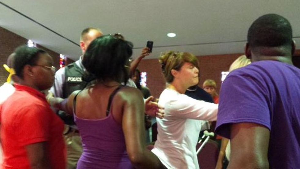 Absolute Chaos in Ferguson': Arrests Made As Fight Breaks Out During Town Hall Meeting Near One Year Mark of Mike Brown's Death