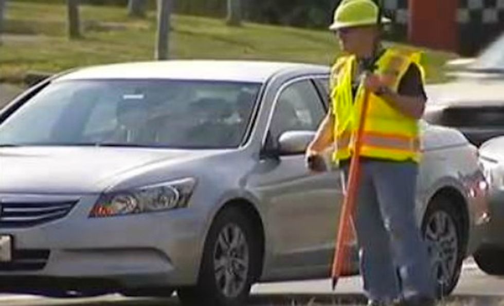 This Guy Might Look Like a Construction Worker, but He's Really Part of an Undercover Police Operation