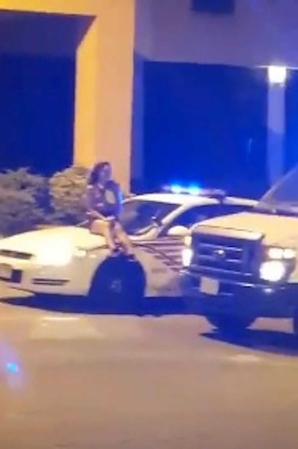 Look Closely at the Car This Woman Is Sitting on and You'll See Why Some D.C. Cops Say They're 'Embarrassed