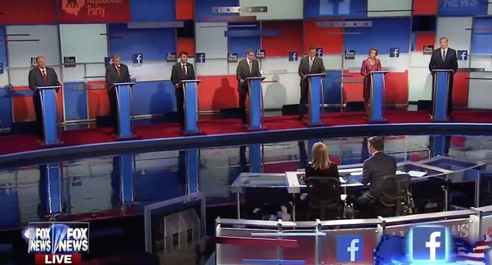 GOP Candidates Asked to Describe Hillary in Two Words. Rick Perry's Response Is Getting Attention