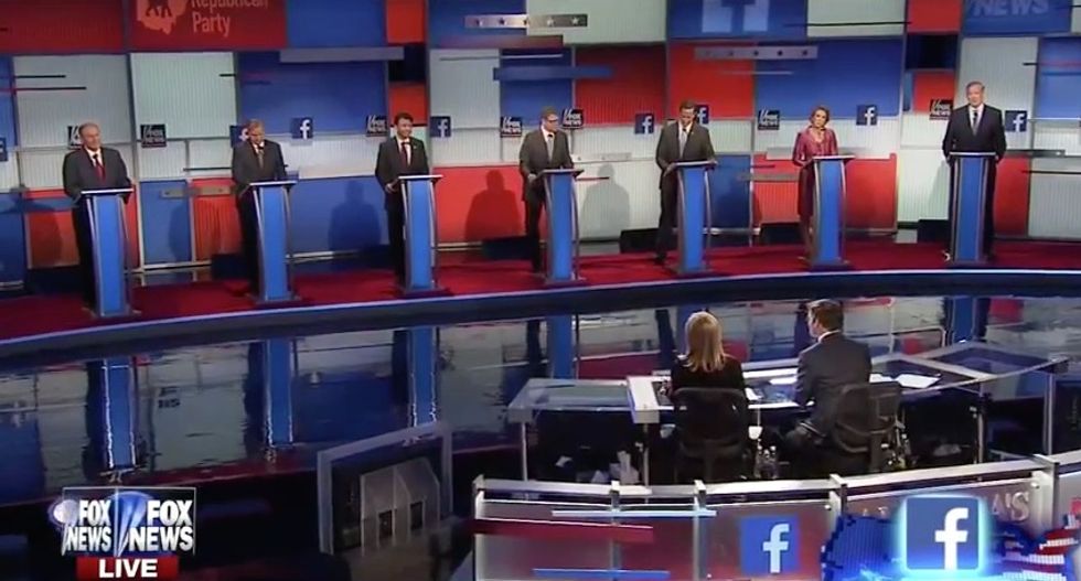 GOP Candidates Asked to Describe Hillary in Two Words. Rick Perry's Response Is Getting Attention