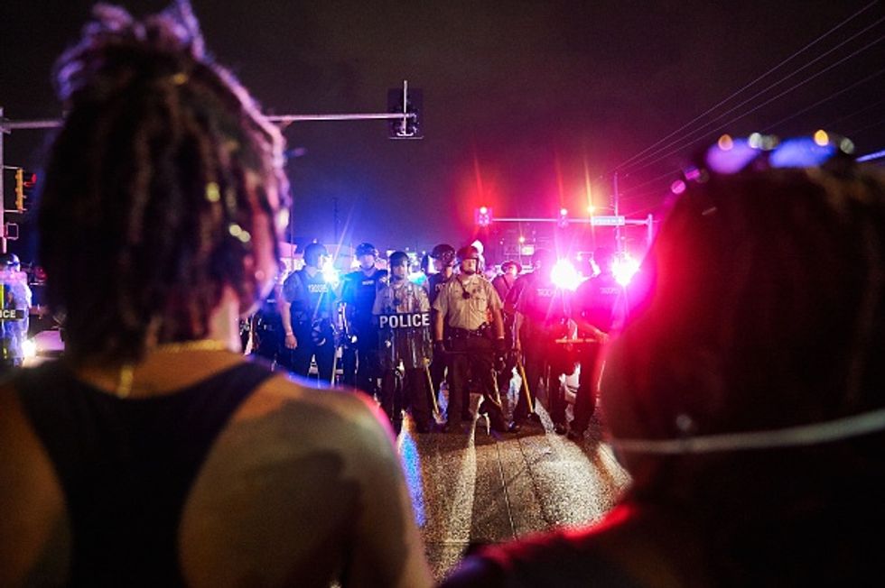 Chaos in Ferguson: Man Shot by Police During Gunfight on Anniversary of Michael Brown Killing