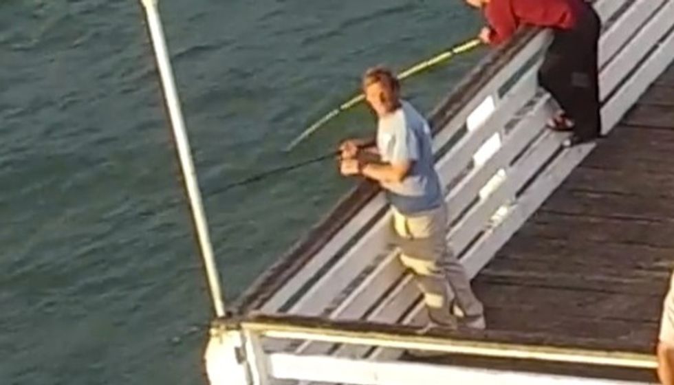 This Fisherman Seemed to Get Fed Up With a Drone Buzzing Around a Pier — So Watch How He Decided to Handle It