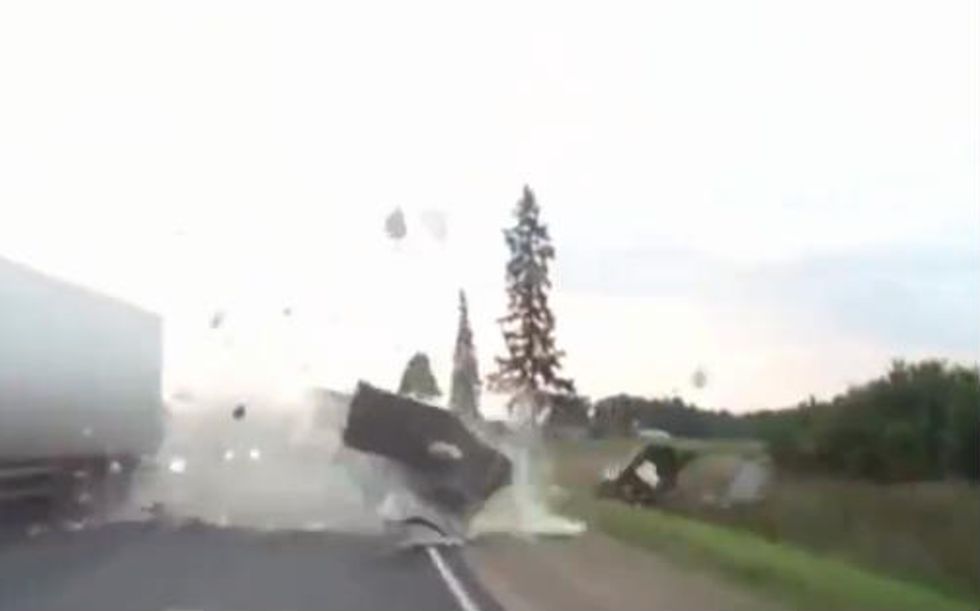 You'll Likely Have to Replay This Russian Dashcam Video of Bicyclists' Insanely Close Call After Truck Collision