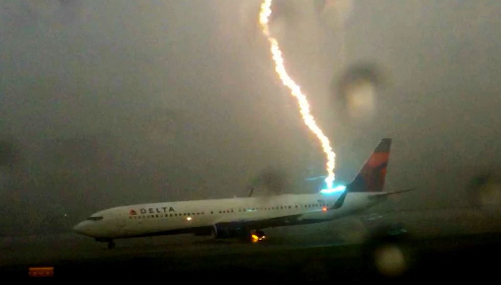Video: Passenger Captures the Incredible Moment Lightning Strikes Plane on Airport Tarmac