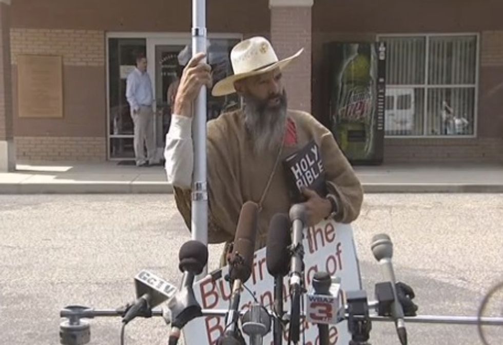 Random Man Approaches the Mics at Kentucky Clerk's Press Conference With a Message: 'I'm Warning You...