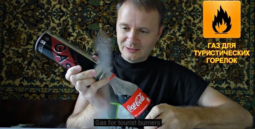 See Reaction After Man Adds Butane Gas to Coke Bottle, Then Flips It Over