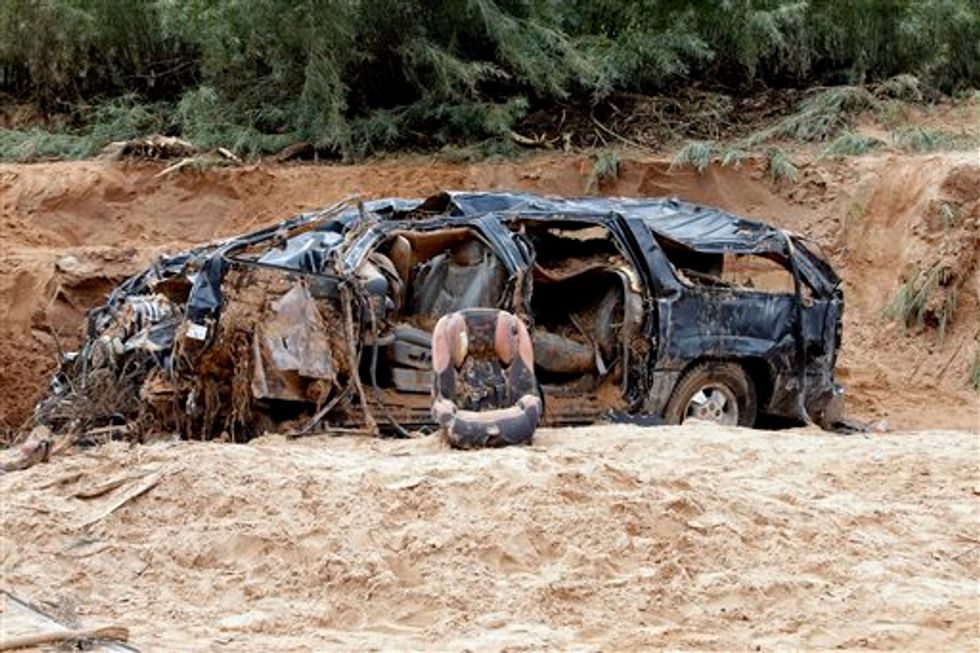 Raw Video: Severe Utah Flood Waters Trap Cars, Carry Away Hikers; 16 Dead