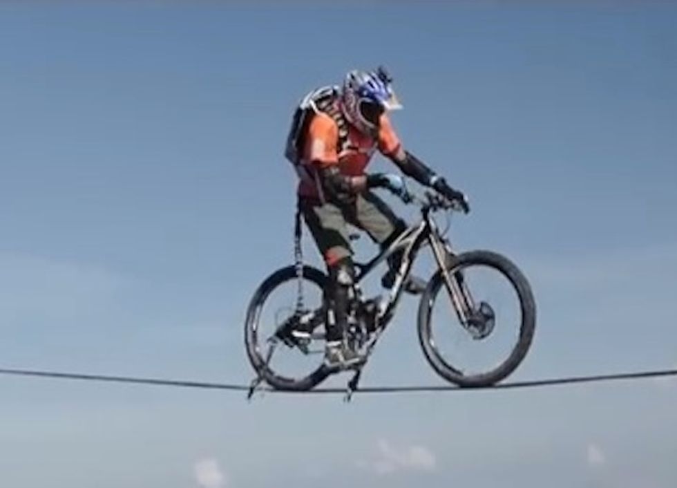 Champion Mountain Biker Just Rode Across a Gap in the French Alps With the Ground 367 Feet Below
