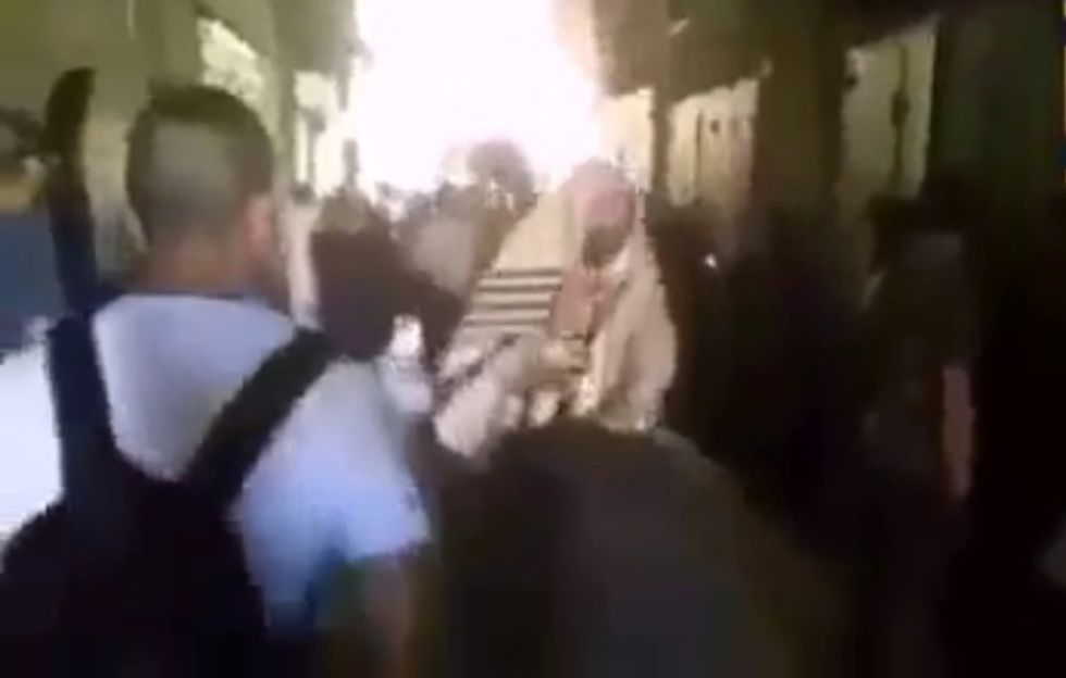 Watch Closely to See What the Man With the Backpack Is About to Do to the Jewish Father Pushing a Baby Stroller