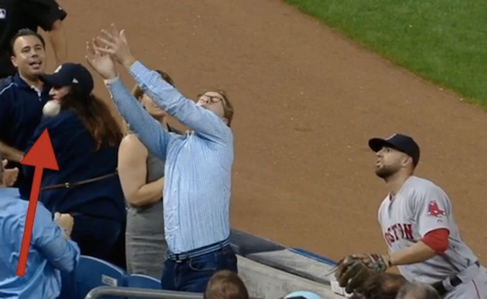 Watch: Baseball Fan Blows Three Chances to Snag a Ball