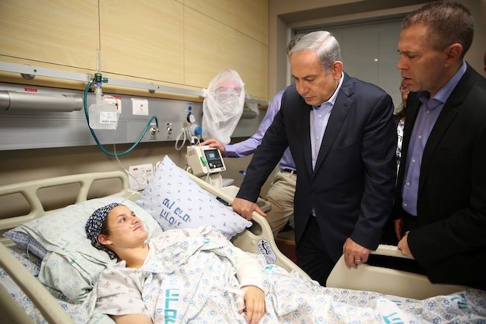 Israeli Stabbing Survivor Details How Palestinian Bystanders Stood by and Laughed While Her Husband Bled to Death