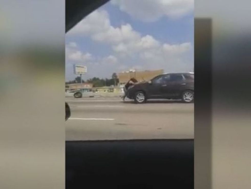 Horrifying Video Shows Woman 32-Weeks-Pregnant Clinging to SUV Hood as Unborn Baby's Father Tries to Flee Along Major Houston Freeway