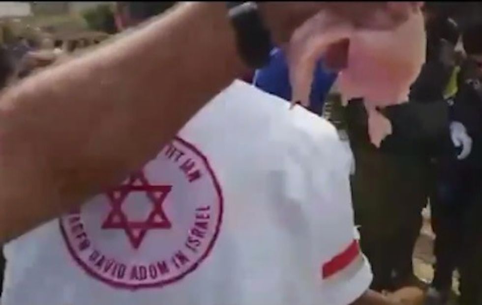 Israeli Man Puts What He Claims to Be Raw Pork on Terrorist’s Body
