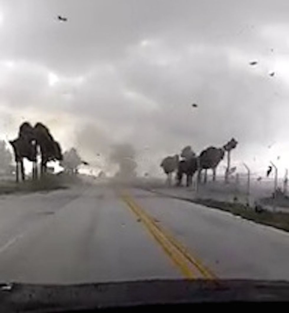 Watch as a Waterspout Passes Over a Florida Skyway Bridge, Knocks Over a Semitruck and Then Sets It Back Upright