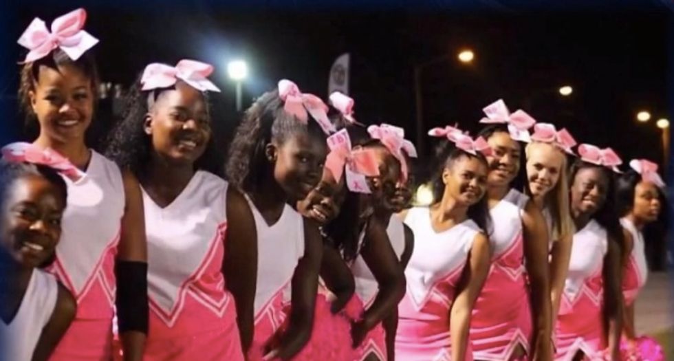 HS Cheerleaders Raised Money to Get Special Pink Uniforms for Breast Cancer Awareness Month and Wore Them Last October. But This Season the District Found Out.
