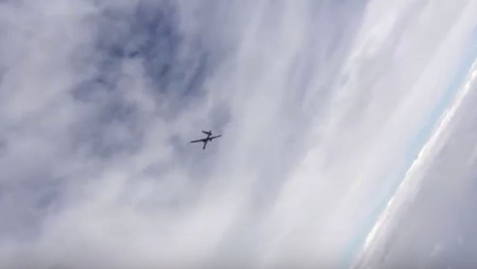 Close Encounter: Russian Pilot Watches a U.S. Drone Make a Flyby Overhead