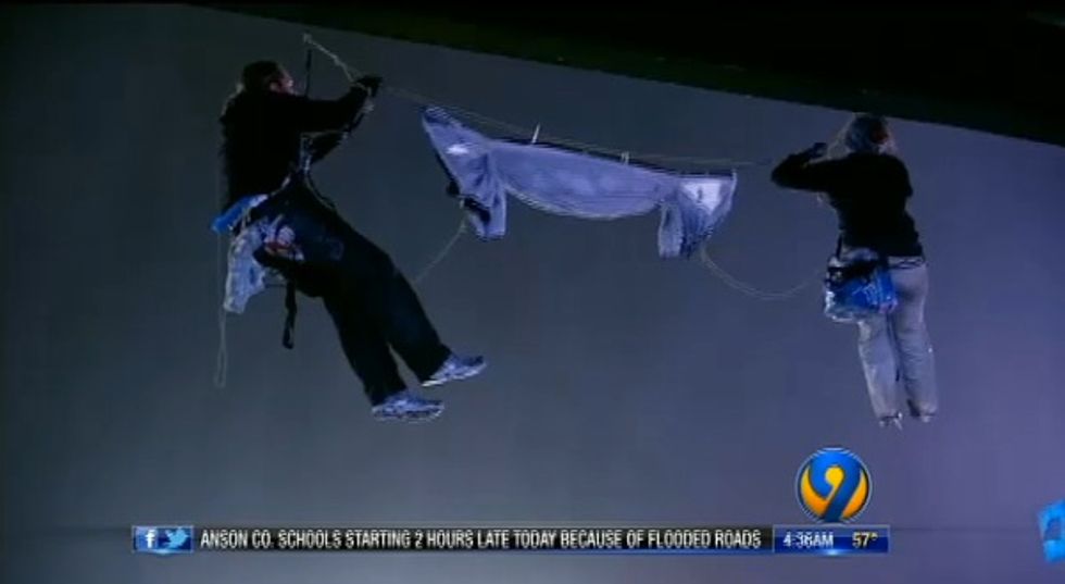 Environmental Activists Crash Monday Night Football Game by Rappelling Over Stadium Balcony