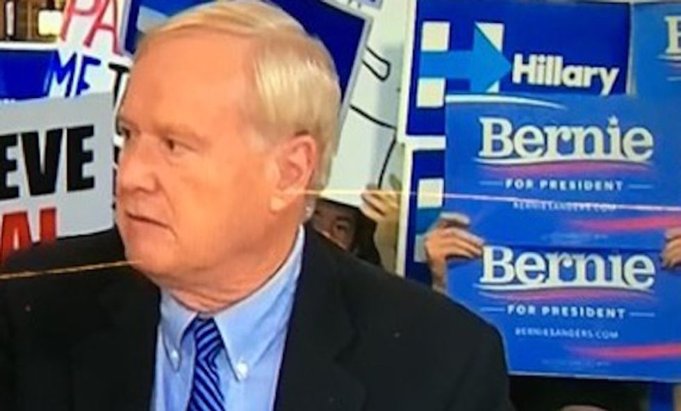 Take a Look at the Sign Someone Held Up on Live TV Behind Chris Matthews & Rachel Maddow