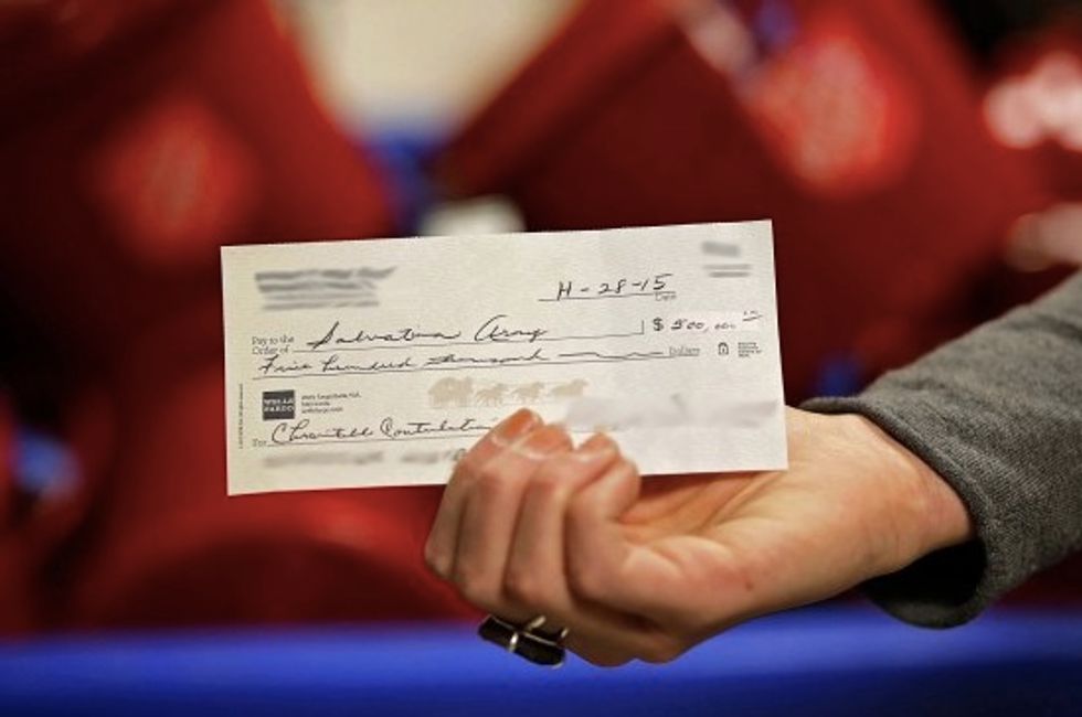 Anonymous Couple Shocked Everyone by Dropping a $500,000 Check in a Salvation Army Kettle. But the Surprises Didn't End There.