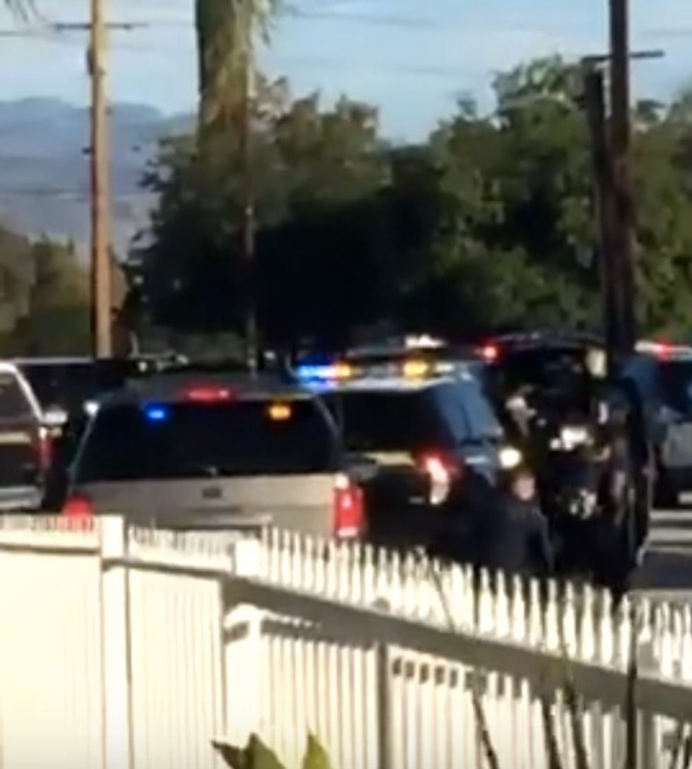 Holy S**t!': Resident Captures Gunfire Barrage on Video as Police Catch Up to San Bernardino Shooting Suspects on His Street