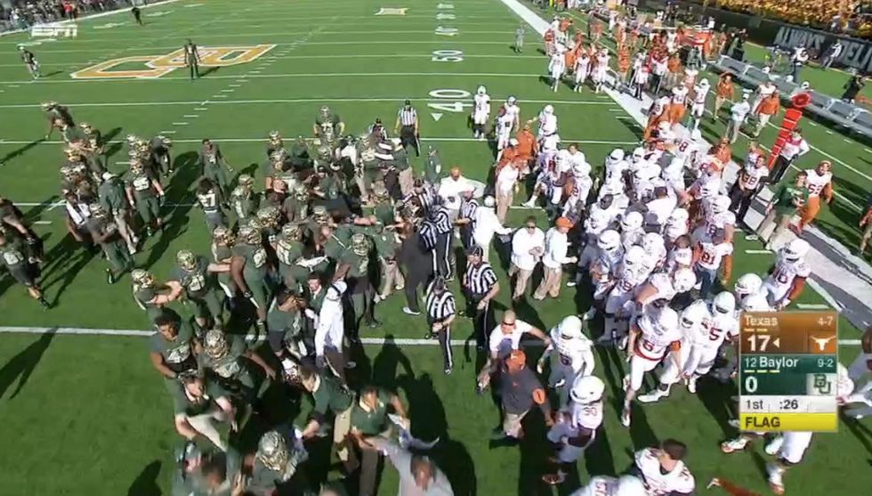 Bench-Clearing Melee Erupts When Quarterback Apparently Adds a Little Extra to Tackle After Throwing an Interception